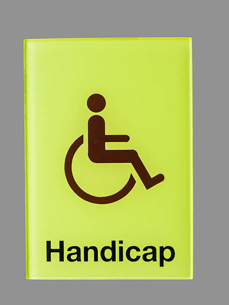 istock Green glass handicap sign isolated on grey  background 515582017