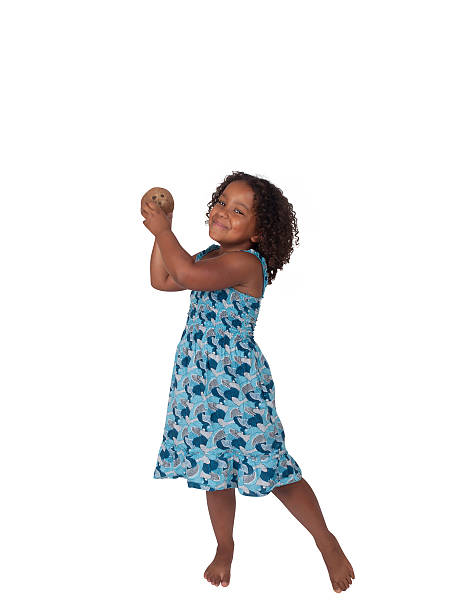 Little Ghanaian - Canadian Girl with coconut stock photo
