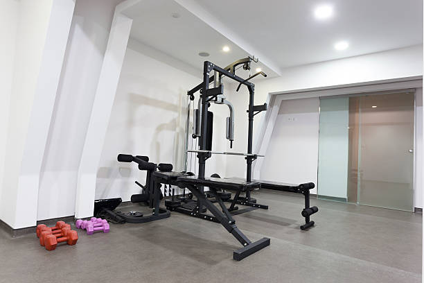 istock Exercise equipment in private gym 515583325