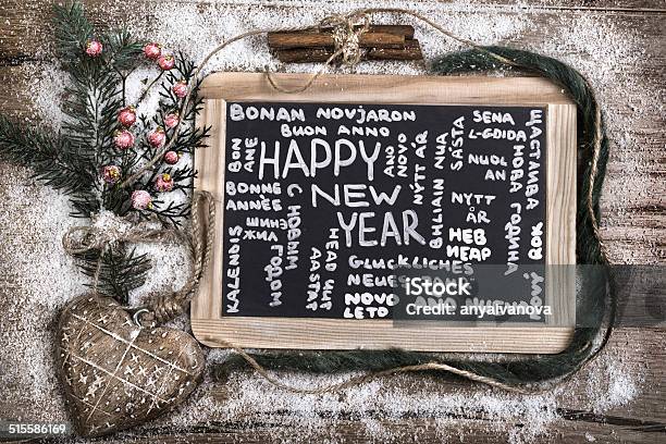 Black Charcoal Board With Caption Happy New Year Stock Photo - Download Image Now - Christmas, Greeting, 2015