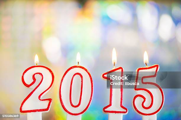 New Year 2015 Birthday Candles With Colorful Boke Background Stock Photo - Download Image Now