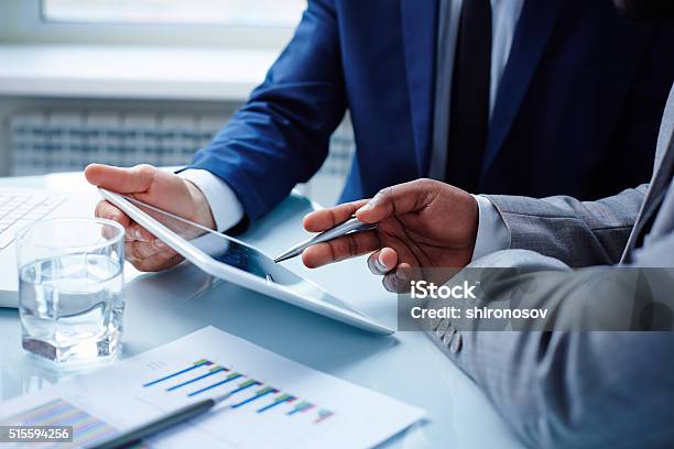 Pointing At Touchpad Stock Photo - Download Image Now - Digital Tablet, Office, Adult