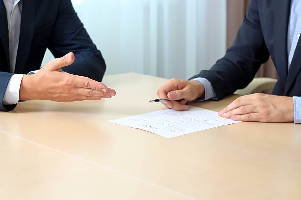 istock Close-up image of a firm handshake between two colleagues 515596938
