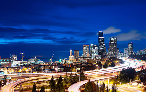 istock traffic on cityroad through modern buildings 515597092