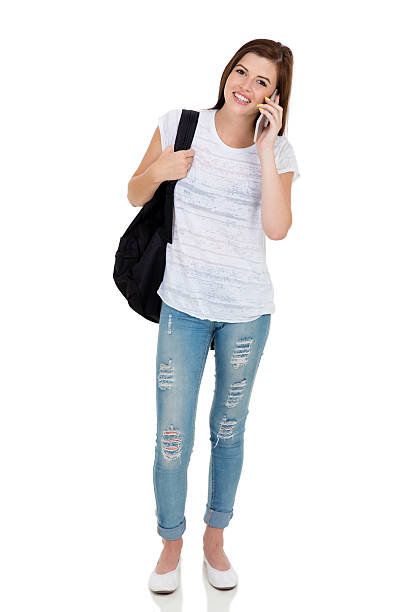 istock young college student talking on cell phone 515597582