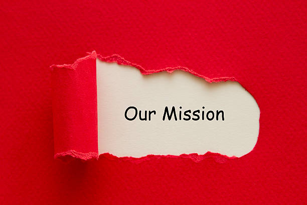 istock Our Mission message written behind torn paper 515598972