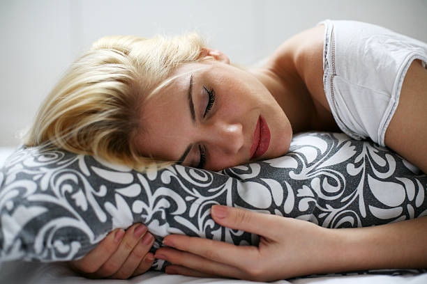 istock Sensual blond woman sleeping in bed. 515599918