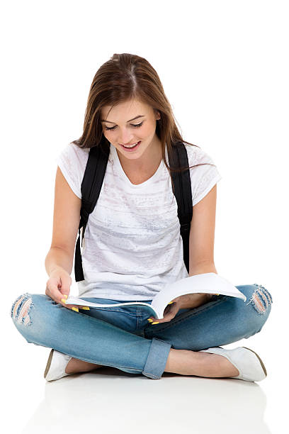 female college student reading a book