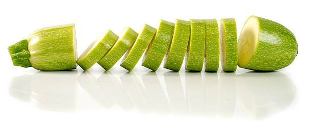 istock Sliced zucchini isolated on a white background 515601276