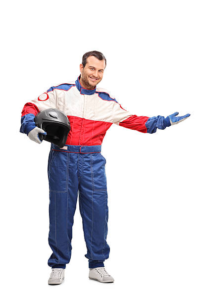 istock Car racer holding a helmet and gesturing 515601354