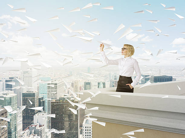 istock Woman with a paper plane 515603076
