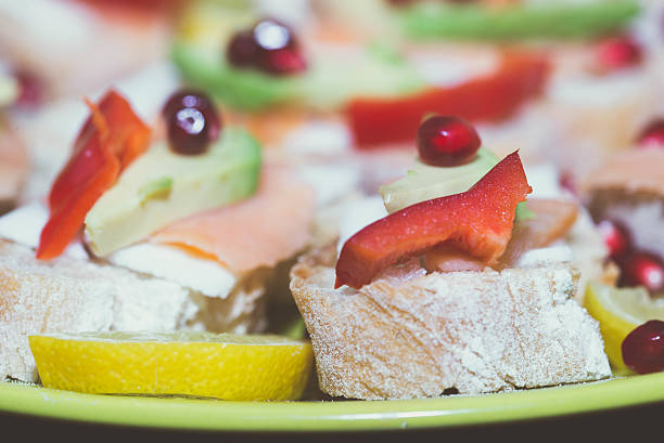 istock sandwiches with salmon, avocado, pepper and pomegranate 515603788