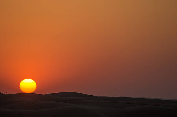 istock Red sunset over the dunes- Dubai 515604218