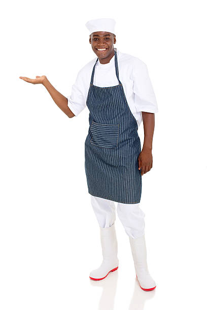 istock male african american chef presenting emtpy space 515606486