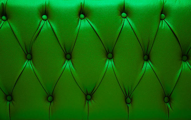 grüne bett kopf - leather green hide textured effect stock-fotos und bilder