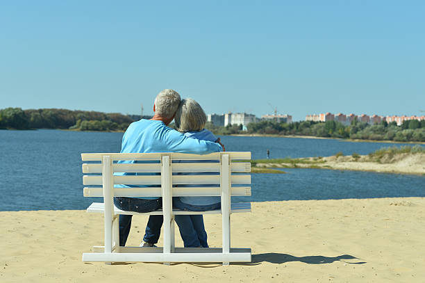 istock Senior couple resting at park 515606948