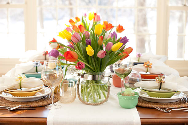 istock Easter Elegant Place Setting Dining Table with Vase of Tulips 515607360