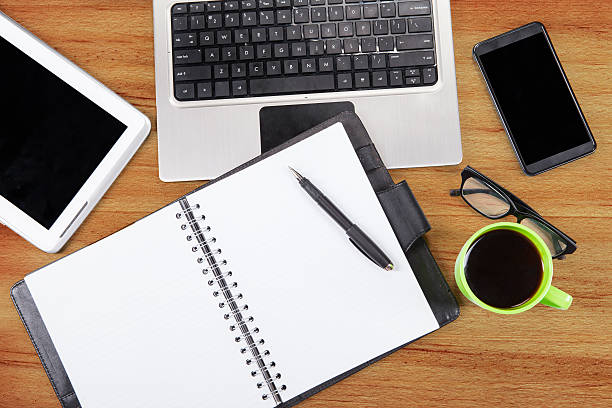 istock High angle view of a business table 515627565