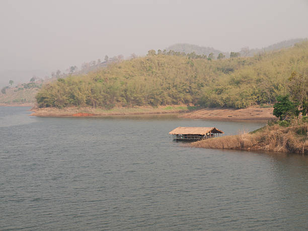 istock Floating bamboo hut in peaceful lake in Chiang rai, Thailand 515632995