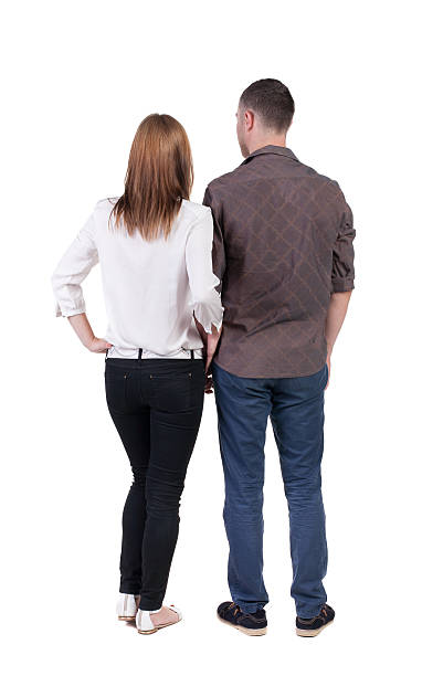 istock Back view of young embracing couple 515633955