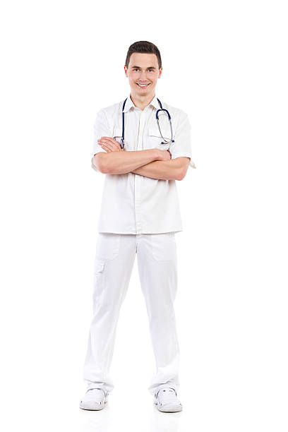 istock Smiling male nurse posing with arms crossed 515634109