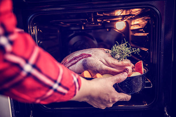 Preparing Traditional Holiday Goose with Side Dishes