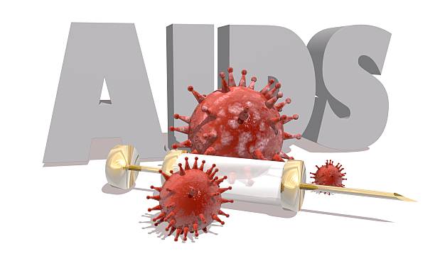 istock AIDS desease, abstract virus models and syringe 515643682