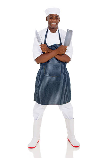 istock young african butcher holding knives 515643734