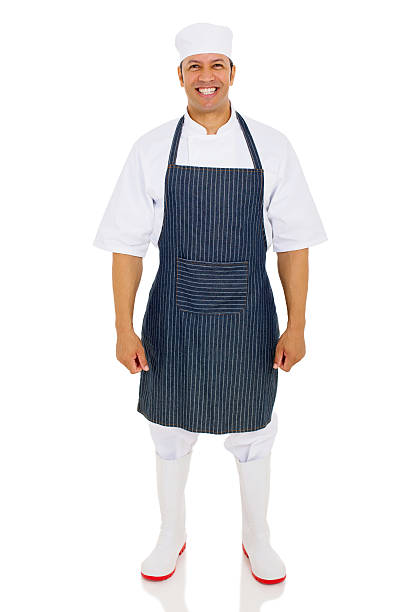 istock mature male butcher standing on white 515645042