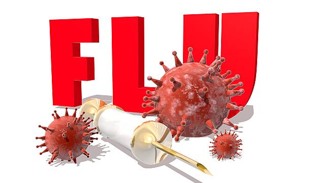istock Flu desease, abstract virus models and syringe 515645758