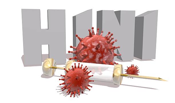istock H1N1 desease, abstract virus models and syringe 515645956