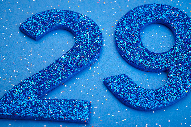 istock Number twentynine blue color over a blue background. Anniversary 515653364