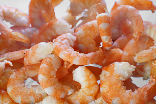 Cooked unshelled tiger shrimps close up