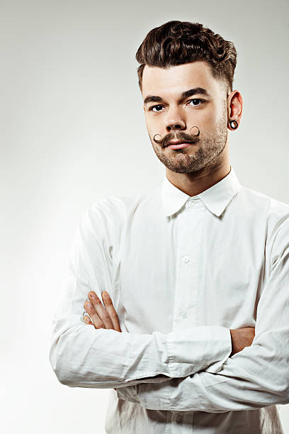 portrait of young man with long moustaches and beard