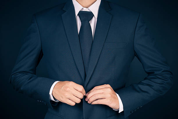 istock Businessman Dressing Up a Black Suit 515657526