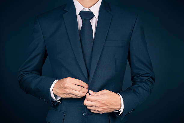 istock Businessman Dressing Up a Black Suit 515657716