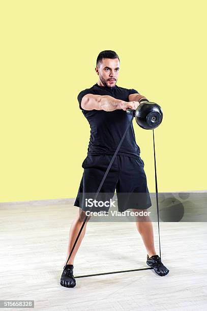 Man Doing Gym Work Out Stock Photo - Download Image Now - Push-ups, Rubber - Material, Kettlebell