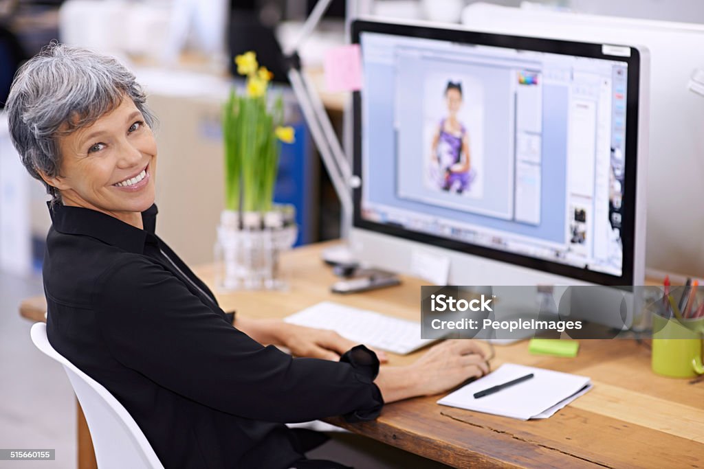 She a true design pro Portrait of a mature female designer working on a desktop computer Computer Monitor Stock Photo