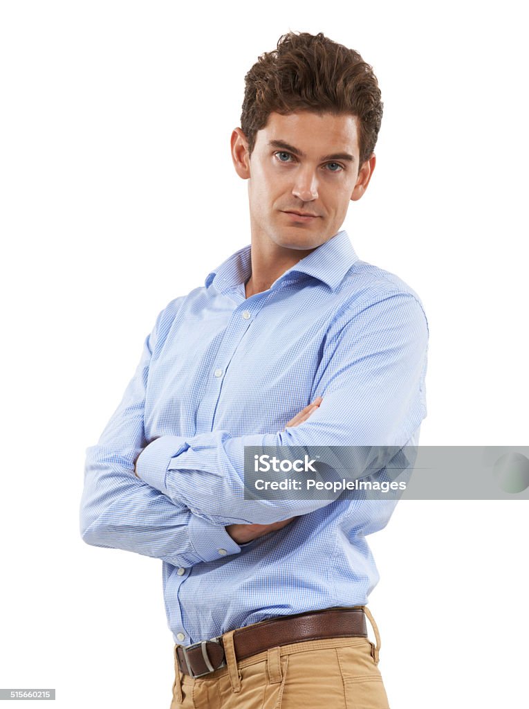 I've got this Portrait of a handsome young man standing in a studio with his arms crossed 20-29 Years Stock Photo