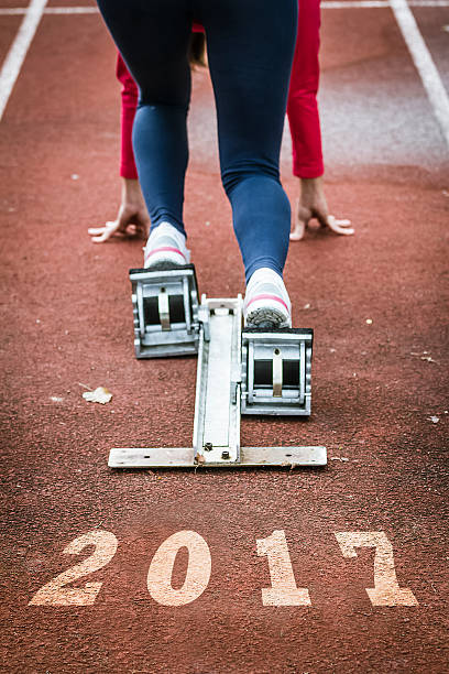 istock Close up view of a female sprinter ready to go 515669232