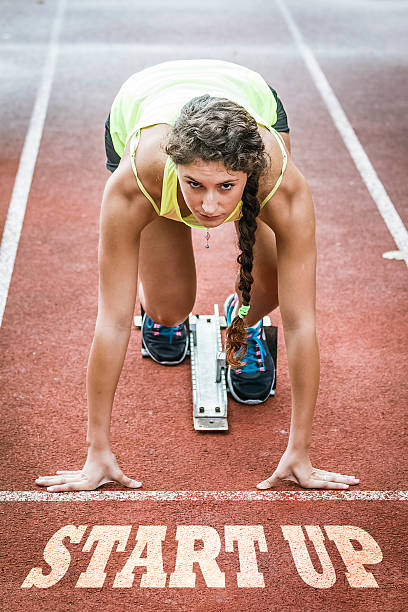 istock Close up view of a female sprinter ready to go 515669356