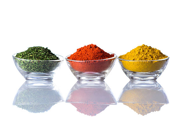 istock Dried Herbs, Paprika and Curry Powder on White 515669678