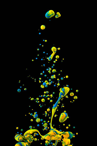 istock Yellow and blu ink drop on black background 515670174