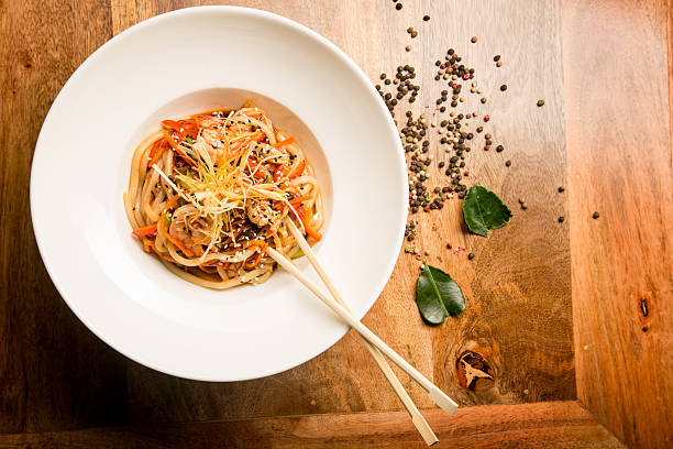 istock Noodles wok, vegetables and meat in the Thai sauce 515671908