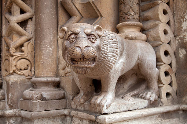 Figure of dog on the fence in spanish town