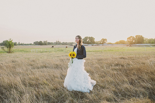 Girl In A Wedding Dress And Jeans Jacket With Sunflowers Stock Photo - Download Image Now - iStock Girl In A Wedding Dress And Jeans Jacket With Sunflowers Stock Photo - Download Image Now - Istock
