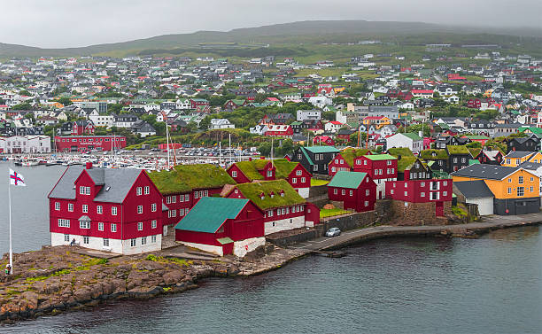 Harbor of capital TÃ³rshavn of Faroe islands, summer time Harbor of capital TÃ³rshavn of Faroe islands, summer, 2015 faroe islands photos stock pictures, royalty-free photos & images