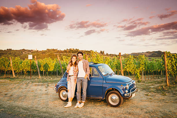 Young Couple Trip With Vintage Car