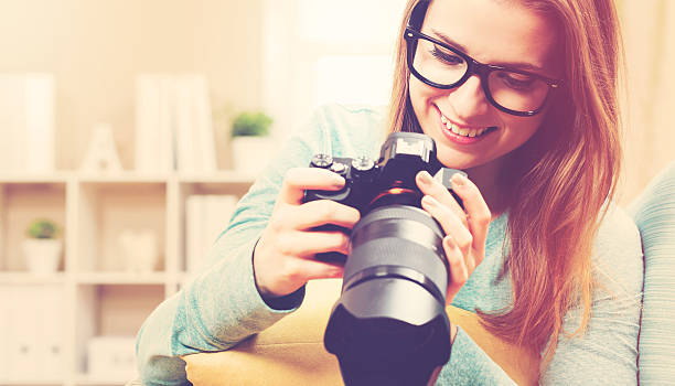 istock Young female photographer 515675576