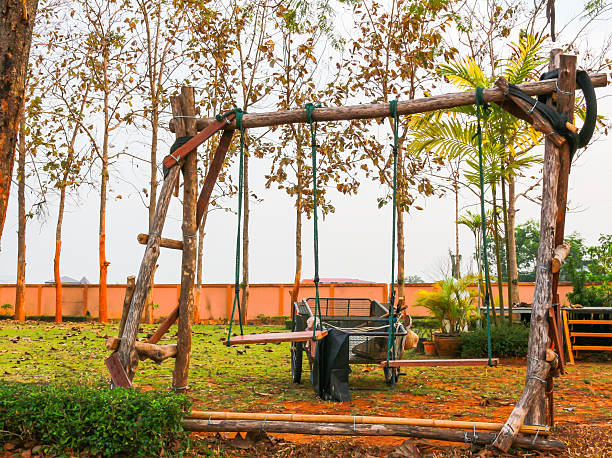 istock The wood swing set and vehicle. 515675604